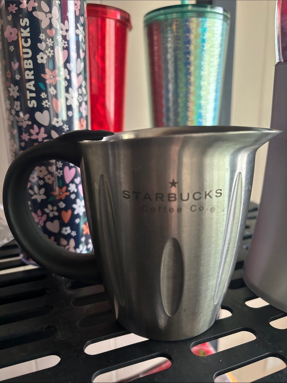 Starbucks frothing cup